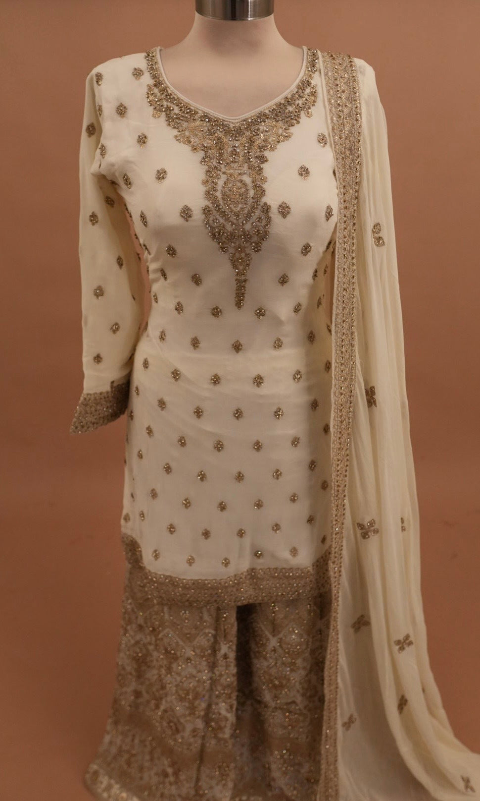 Off White Color Georgette Fabric Heavy Palazzo Suit