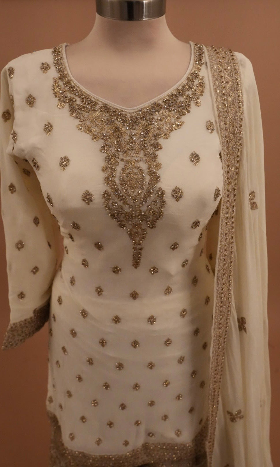 Off White Color Georgette Fabric Heavy Palazzo Suit