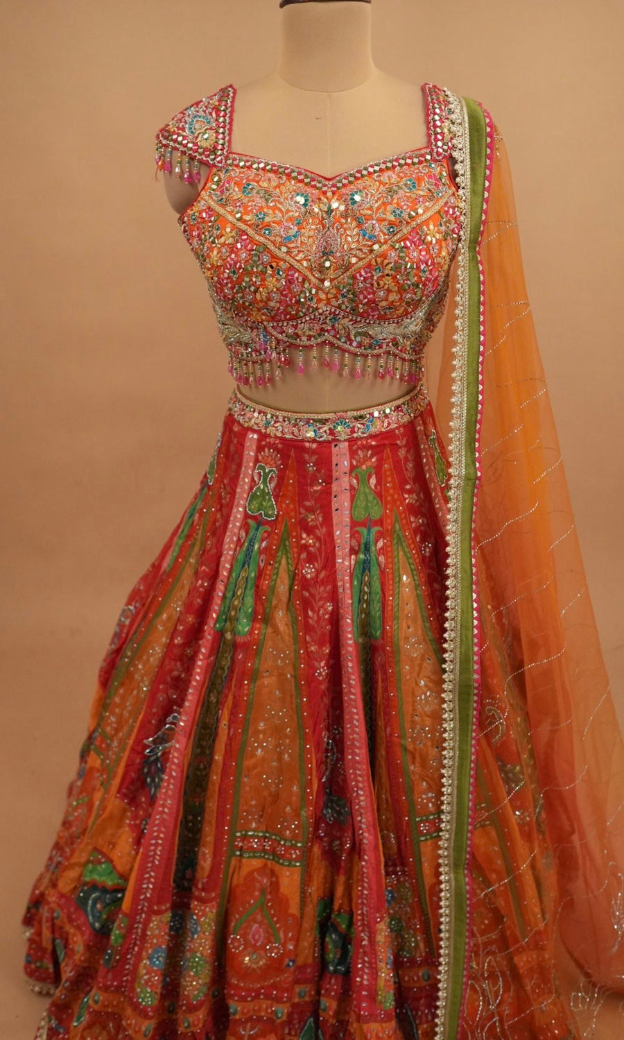 Orange Multicolor Heavy Embroidered Party Wear Lehenga Set