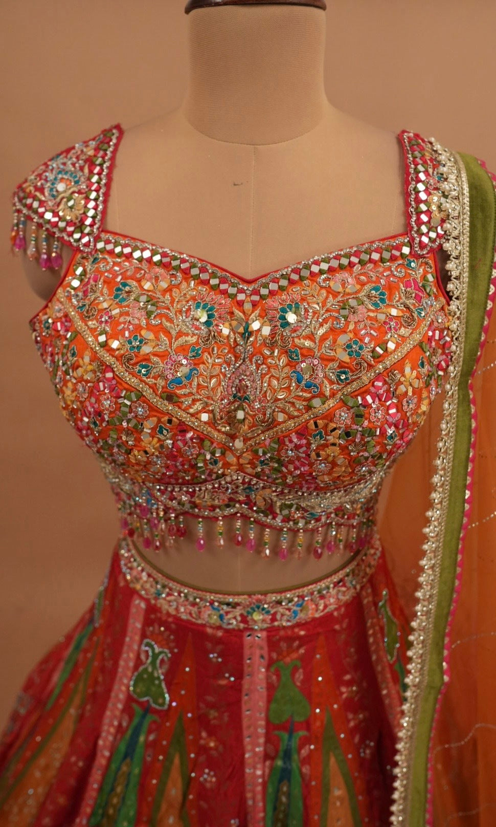 Orange Multicolor Heavy Embroidered Party Wear Lehenga Set
